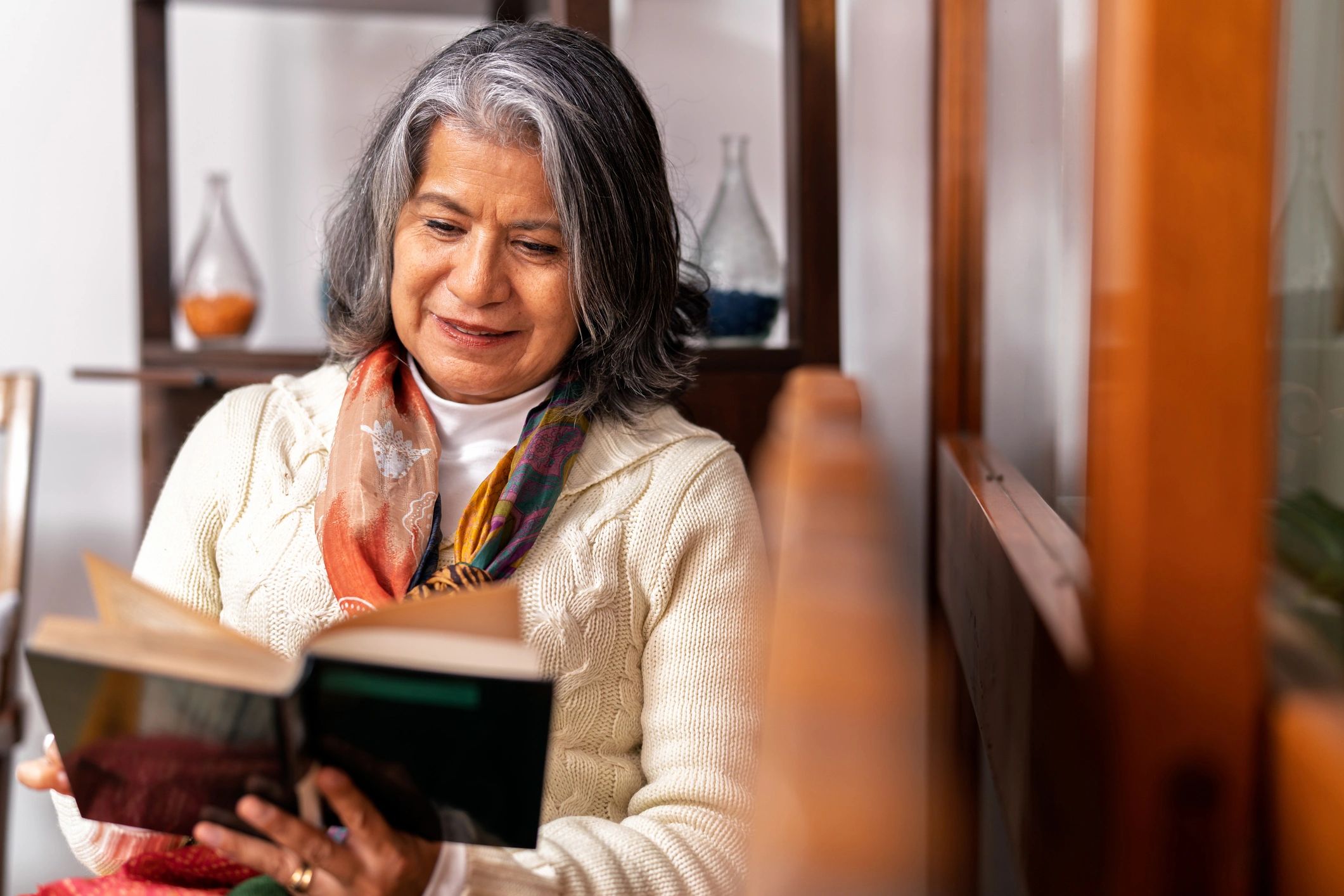 Customer portrait reading a book